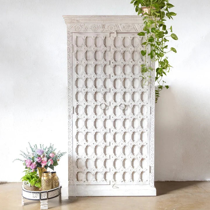 hand carved cabinet, solid wood cabinet, all white cabinet, tall cabinet, white cabinet, floral carved cabinet, bookshelf cabinet, open shelving cabinet, 2 drawer cabinet, 1 door cabinet, indian furniture, storage cabinet, dining room cabinet, kitchen cabinet, living room cabinet, bedroom cabinet, display cabinet, handmade cabinet, artisan made cabinet, premium wood cabinet, quality wood furniture, durable cabinet, sturdy cabinet, timeless cabinet, elegant cabinet, statement cabinet, grand cabinet, heirloom