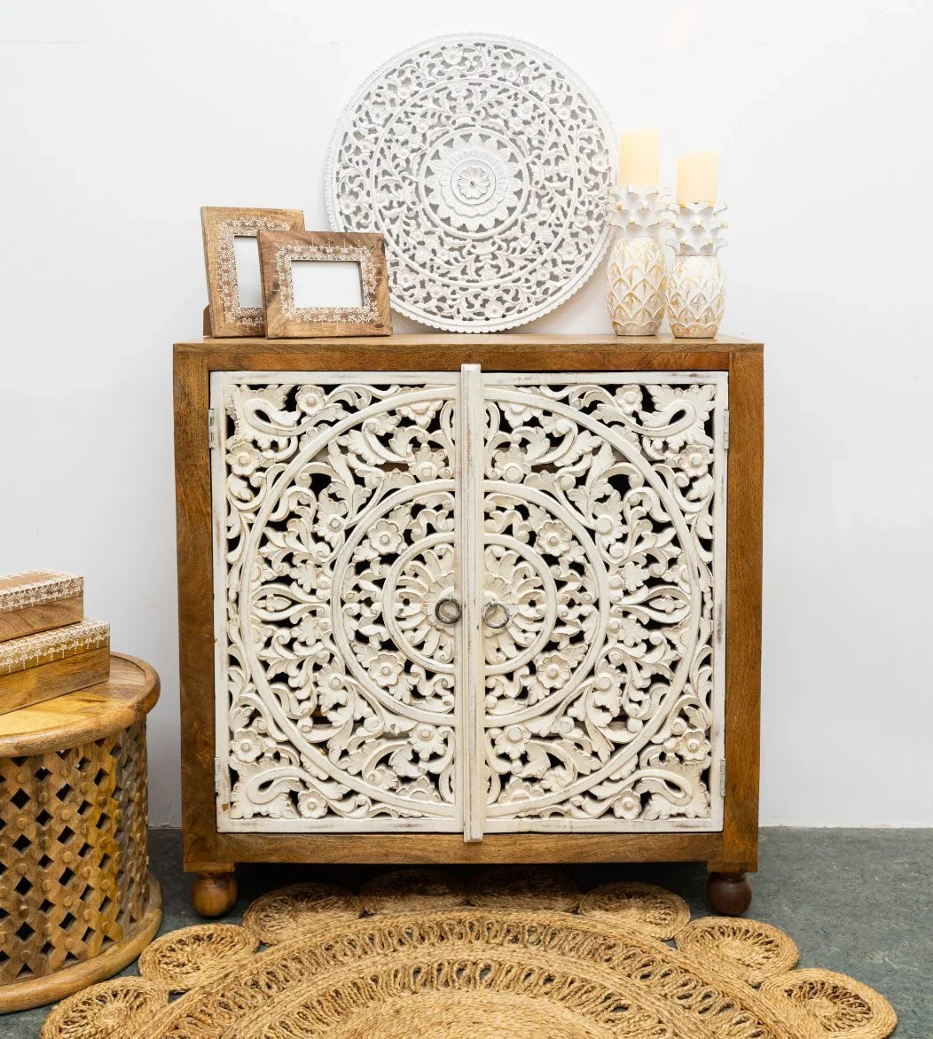 hand carved cabinet, mango wood cabinet, 2 door cabinet, two tone cabinet, white and natural cabinet, floral carved cabinet, openwork cabinet, indian carved furniture, storage cabinet, dining room cabinet, living room cabinet, bedroom cabinet, entryway cabinet, accent cabinet, statement cabinet, compact cabinet, handmade cabinet, artisan made cabinet, premium wood cabinet, quality wood furniture, durable cabinet, sturdy cabinet, timeless cabinet, elegant cabinet, heirloom cabinet, coastal cabinet, eclectic