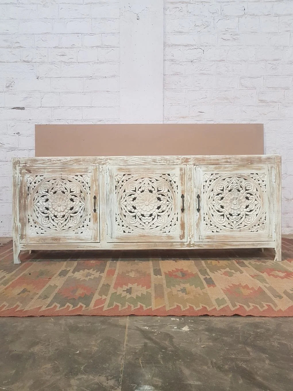 Large 3‑door sideboard with mandala medallion carving, coastal shabby‑chic style.