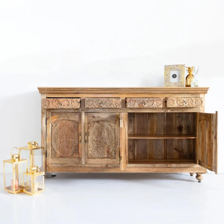 hand carved sideboard, mango wood sideboard, natural finish sideboard, floral carved sideboard, 4 door sideboard, 4 drawer sideboard, buffet sideboard, indian carved furniture, storage sideboard, dining room buffet, living room sideboard, entryway sideboard, statement sideboard, large sideboard, handmade sideboard, artisan made sideboard, premium wood buffet, quality wood furniture, durable sideboard, sturdy buffet, timeless sideboard, elegant buffet, grand sideboard, heirloom buffet, rustic sideboard, trad