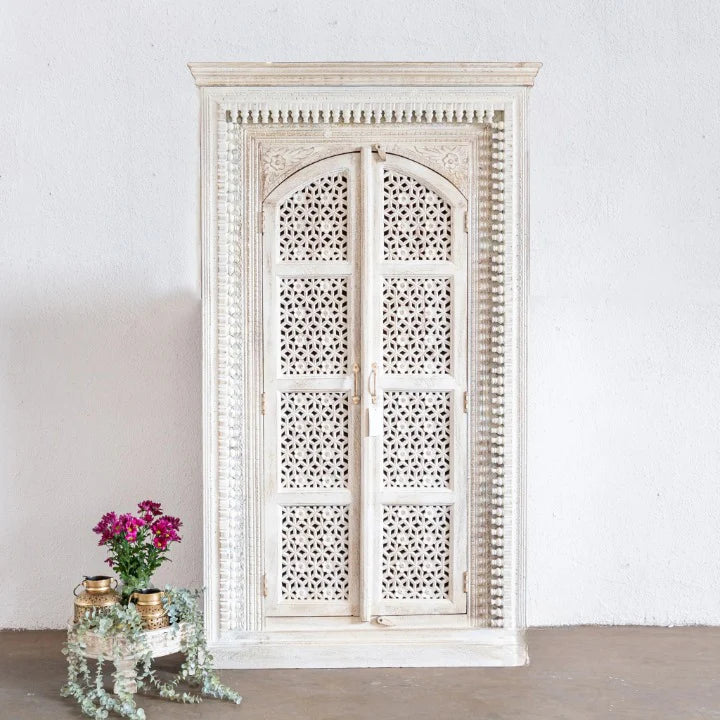 hand carved cabinet, mango wood cabinet, jali work cabinet, arched door cabinet, tall cabinet, whitewashed cabinet, openwork cabinet, lattice carved cabinet, 2 door cabinet, mehrab cabinet, indian furniture, storage cabinet, dining room cabinet, living room cabinet, bedroom cabinet, hallway cabinet, linen cabinet, handmade cabinet, artisan made cabinet, premium wood cabinet, quality wood furniture, durable cabinet, sturdy cabinet, timeless cabinet, elegant cabinet, statement cabinet, grand cabinet, heirloom