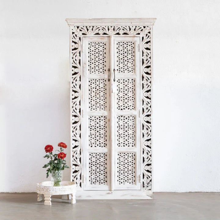 hand carved cabinet, mango wood cabinet, jali work cabinet, tall cabinet, whitewashed cabinet, openwork cabinet, lattice carved cabinet, 2 door cabinet, indian furniture, storage cabinet, dining room cabinet, living room cabinet, bedroom cabinet, hallway cabinet, linen cabinet, handmade cabinet, artisan made cabinet, premium wood cabinet, quality wood furniture, durable cabinet, sturdy cabinet, timeless cabinet, elegant cabinet, statement cabinet, grand cabinet, heirloom cabinet, coastal cabinet, shabby chi
