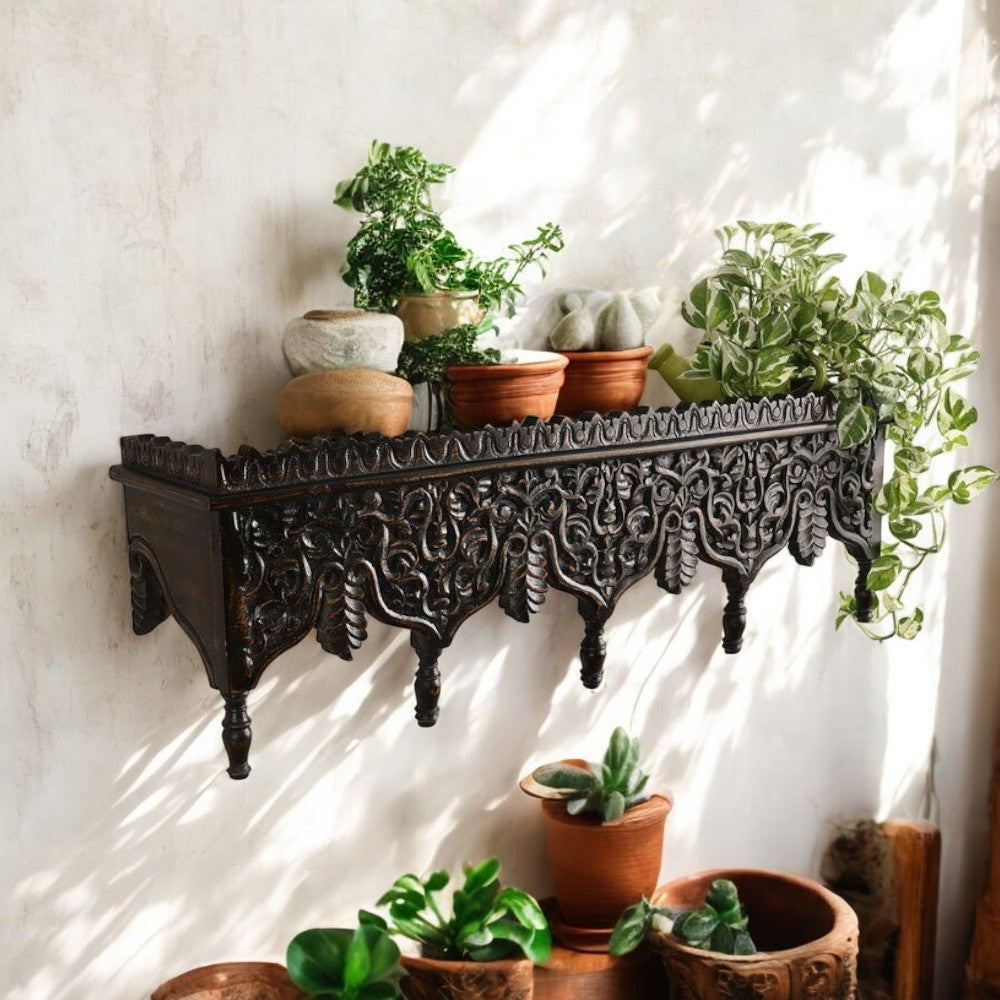 "Jodhpur hand-carved wooden wall shelf with ornate Rajasthani design, mounted on a wall."
