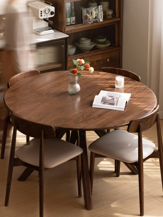 "Coordinated table and chair set offering effortless dining room styling."
