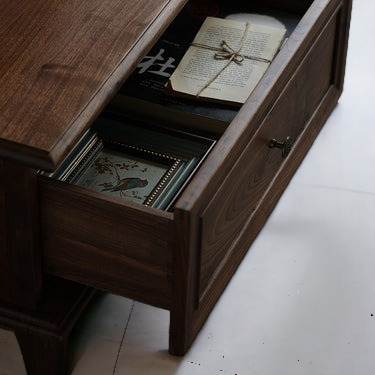 Vintage Coffee Tables: "Charming vintage coffee table with intricate detailing, offering a timeless appeal."
