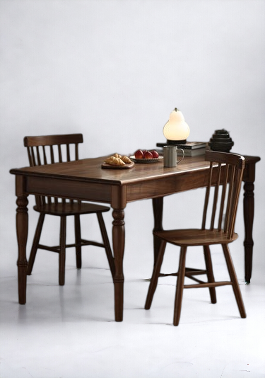 Small dining table for compact spaces, styled with minimalistic decor.