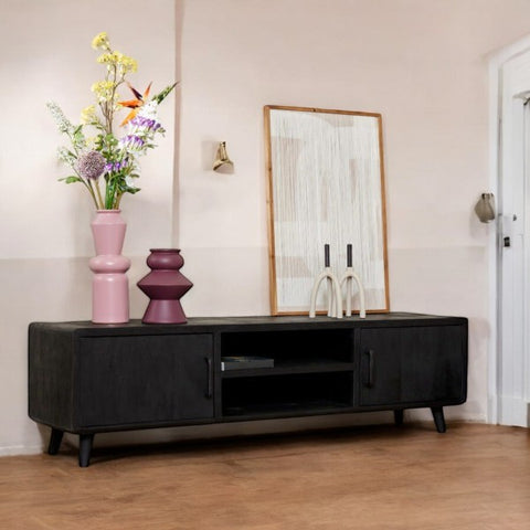 Black TV cabinet with sleek design and ample storage for modern living rooms.
