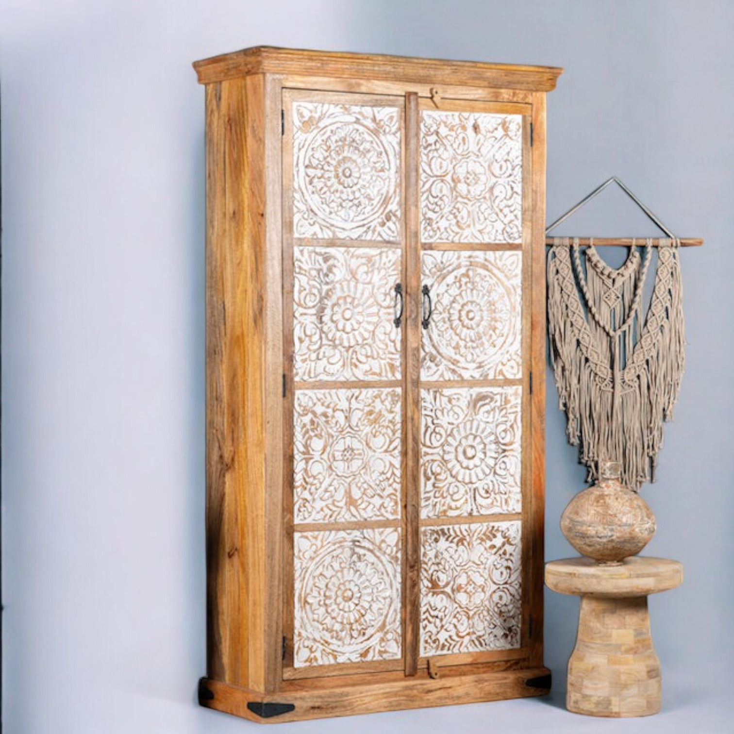 "Beautiful clothing armoire with adjustable wardrobe shelves for neat organization."
