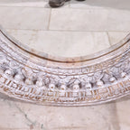 mango wood mirror, carved mirror, round mirror, whitewash mirror, oriental mirror, wall mirror, statement mirror, circular mirror, coastal mirror, bohemian mirror, handmade mirror, artisan mirror, premium mirror, quality mirror, durable mirror, elegant mirror, unique mirror, decorative mirror, focal piece mirror, handcrafted in india, sustainable mango wood, whitewash finish, white wash, warm wood undertones, hand carved frame, ball and spindle carving, ornamental garlands, concentric circles, basketweave p