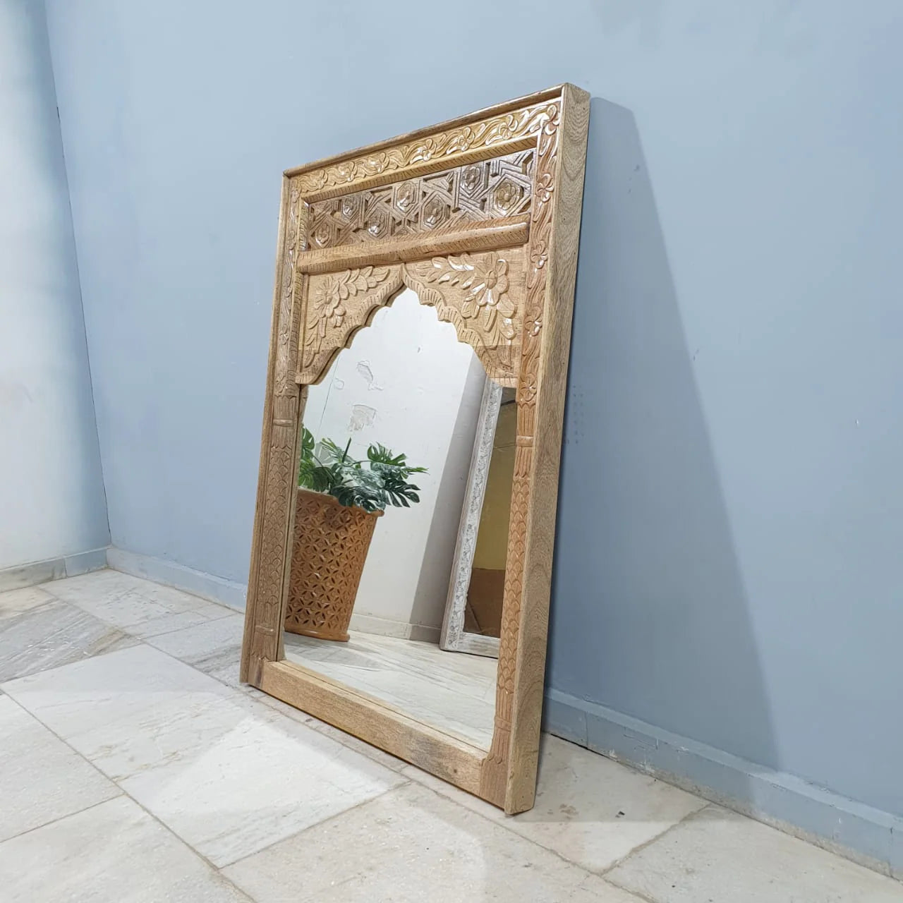mango wood mirror, carved mirror, mehrab mirror, arched mirror, islamic mirror, moroccan mirror, natural wood mirror, wall mirror, statement mirror, architectural mirror, jali mirror, mughal mirror, traditional mirror, handmade mirror, artisan mirror, premium mirror, quality mirror, durable mirror, elegant mirror, unique mirror, decorative mirror, focal piece mirror, handcrafted in india, sustainable mango wood, natural wood finish, honey wood, clear coating, hand carved frame, mehrab arch, pointed arch, ja