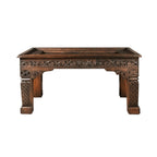 hand carved coffee table, mango wood coffee table, walnut coffee table, carved wood table, rectangular coffee table, indian furniture, living room table, statement coffee table, handmade coffee table, artisan made table, premium wood table, quality furniture, durable table, sturdy table, timeless table, elegant table, ornate table, unique table, sculptural table, focal piece table, handcrafted in india, sustainable mango wood, rich walnut finish, walnut stain, geometric patterns, scrolling vines, scrolling 