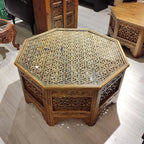 hand carved coffee table, jali coffee table, mango wood coffee table, octagonal coffee table, lattice coffee table, carved wood table, indian furniture, living room table, statement coffee table, handmade coffee table, artisan made table, premium wood table, quality furniture, durable table, sturdy table, timeless table, elegant table, ornate table, unique table, sculptural table, focal piece table, handcrafted in india, sustainable mango wood, whitewash finish, light walnut finish, jali lattice, star latti