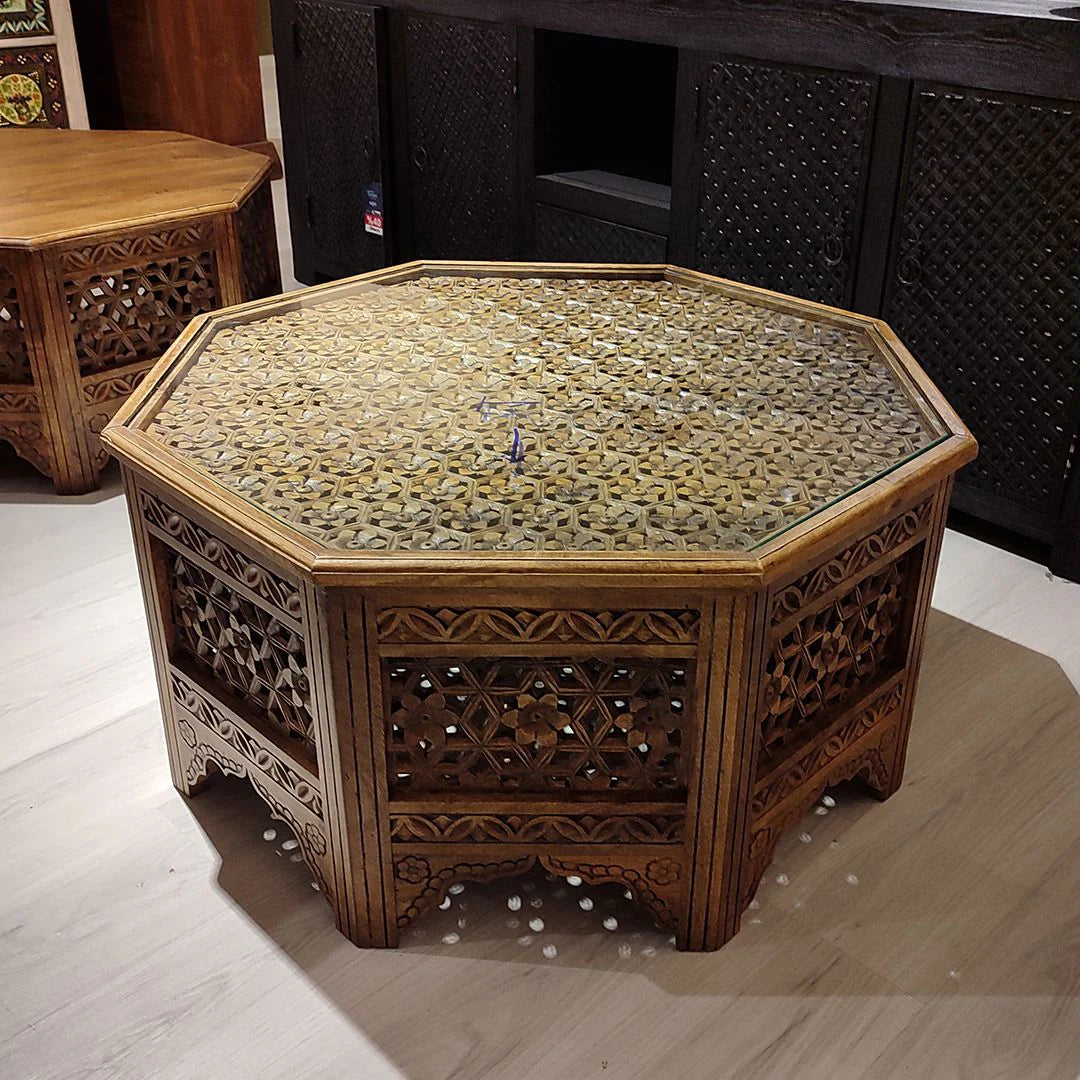 hand carved coffee table, jali coffee table, mango wood coffee table, octagonal coffee table, lattice coffee table, carved wood table, indian furniture, living room table, statement coffee table, handmade coffee table, artisan made table, premium wood table, quality furniture, durable table, sturdy table, timeless table, elegant table, ornate table, unique table, sculptural table, focal piece table, handcrafted in india, sustainable mango wood, whitewash finish, light walnut finish, jali lattice, star latti