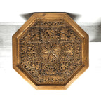 hand carved coffee table, solid wood coffee table, octagonal coffee table, carved wood table, natural wood table, indian furniture, living room table, statement coffee table, mehrab arch table, handmade coffee table, artisan made table, premium wood table, quality furniture, durable table, sturdy table, timeless table, elegant table, ornate table, unique table, sculptural table, focal piece table, handcrafted in india, sustainable wood furniture, star medallion design, geometric patterns, scrolling vines, f
