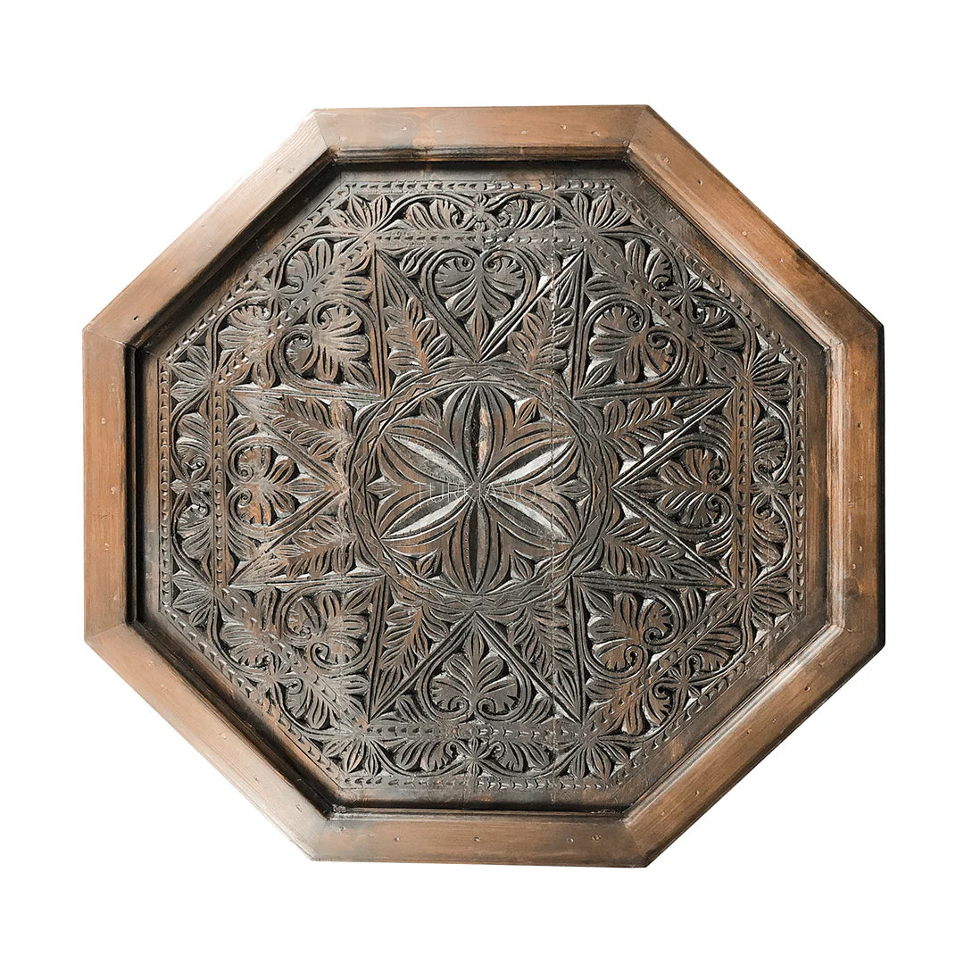 hand carved coffee table, solid wood coffee table, octagonal coffee table, carved wood table, indian furniture, living room table, statement coffee table, mehrab arch table, handmade coffee table, artisan made table, premium wood table, quality furniture, durable table, sturdy table, timeless table, elegant table, ornate table, unique table, sculptural table, focal piece table, handcrafted in india, sustainable wood furniture, star medallion design, geometric patterns, scrolling vines, floral rosettes, mehr