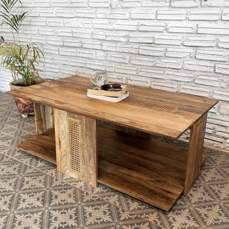 mango wood table, cane coffee table, rattan coffee table, rectangular table, walnut finish table, storage coffee table, woven cane table, coastal table, mid century table, bohemian table, living room table, statement coffee table, handmade coffee table, artisan made table, premium wood table, quality furniture, durable table, sturdy table, timeless table, elegant table, unique table, sculptural table, focal piece table, handcrafted in india, sustainable mango wood, natural wood grain, walnut brown finish, w