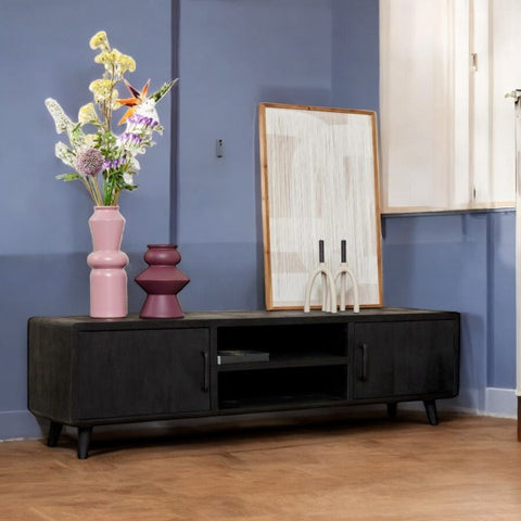 Wood TV stand crafted from solid wood for durability and elegance.
