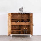 hand carved bar cabinet, mango wood bar cabinet, whitewashed bar cabinet, bar cabinet on stand, metal stand cabinet, sunburst carved cabinet, wine cabinet, liquor cabinet, home bar cabinet, dining room bar cabinet, living room bar cabinet, storage cabinet, 2 door cabinet, 2 drawer cabinet, wine rack cabinet, handmade bar cabinet, artisan made cabinet, premium wood cabinet, quality wood furniture, durable bar cabinet, sturdy cabinet, timeless bar cabinet, elegant cabinet, statement bar cabinet, industrial st