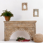 Add sophistication to your entrance with a wooden entryway table for decorative flair.

