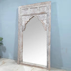 hand carved mirror, mango wood mirror, rustic white mirror, distressed white mirror, large mirror, oversized mirror, full length mirror, wall mirror, mehrab arch mirror, arched mirror, jali lattice mirror, entryway mirror, dressing mirror, decorative mirror, indian furniture, handmade mirror, artisan made mirror, premium wood mirror, quality mirror, durable mirror, sturdy mirror, timeless mirror, elegant mirror, statement mirror, ornate mirror, unique mirror, sculptural mirror, focal piece mirror, handcraft