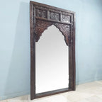 hand carved mirror, mango wood mirror, rustic white mirror, distressed white mirror, large mirror, oversized mirror, full length mirror, wall mirror, mehrab arch mirror, arched mirror, jali lattice mirror, entryway mirror, dressing mirror, decorative mirror, indian furniture, handmade mirror, artisan made mirror, premium wood mirror, quality mirror, durable mirror, sturdy mirror, timeless mirror, elegant mirror, statement mirror, ornate mirror, unique mirror, sculptural mirror, focal piece mirror, handcraft