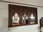 mango wood mirror, carved mirror, jharokha mirror, triple arch mirror, rajasthani mirror, indian mirror, vintage mirror, rustic mirror, antique mirror, distressed mirror, horizontal mirror, wall mirror, statement mirror, architectural mirror, palace mirror, traditional mirror, handmade mirror, artisan mirror, premium mirror, quality mirror, durable mirror, elegant mirror, unique mirror, decorative mirror, focal piece mirror, handcrafted in india, sustainable mango wood, rustic antique, antique finish, multi