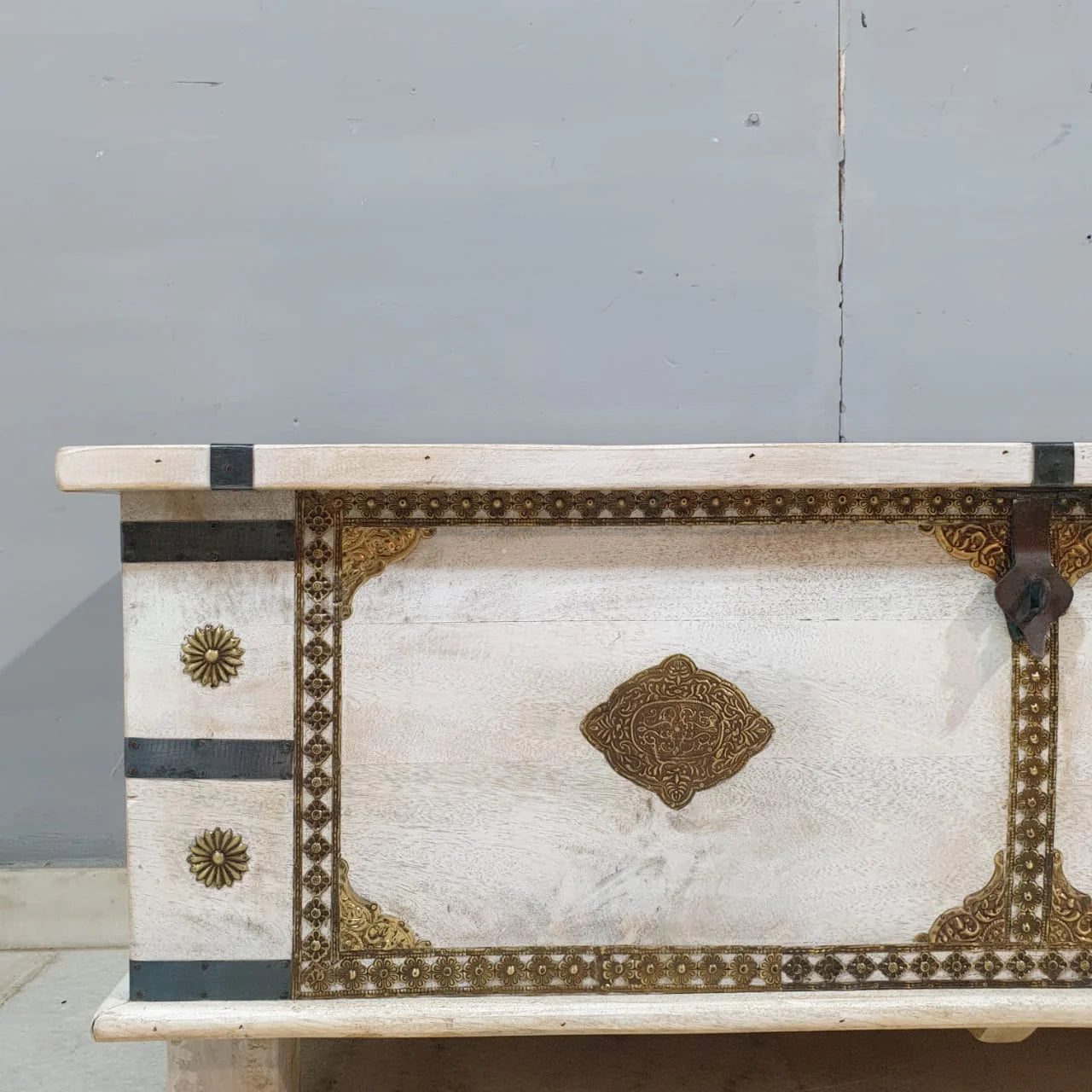 hand carved blanket box, wooden trunk, whitewashed blanket box, brass fittings box, brass medallion trunk, blanket trunk, linen chest, indian furniture, bedroom blanket box, living room trunk, entryway chest, storage bench, coffee table trunk, handmade blanket box, artisan made trunk, premium wood chest, quality wood furniture, durable trunk, sturdy blanket box, timeless chest, elegant trunk, statement blanket box, heirloom chest, mughal style trunk, vintage blanket box, eclectic chest, coastal trunk, rusti