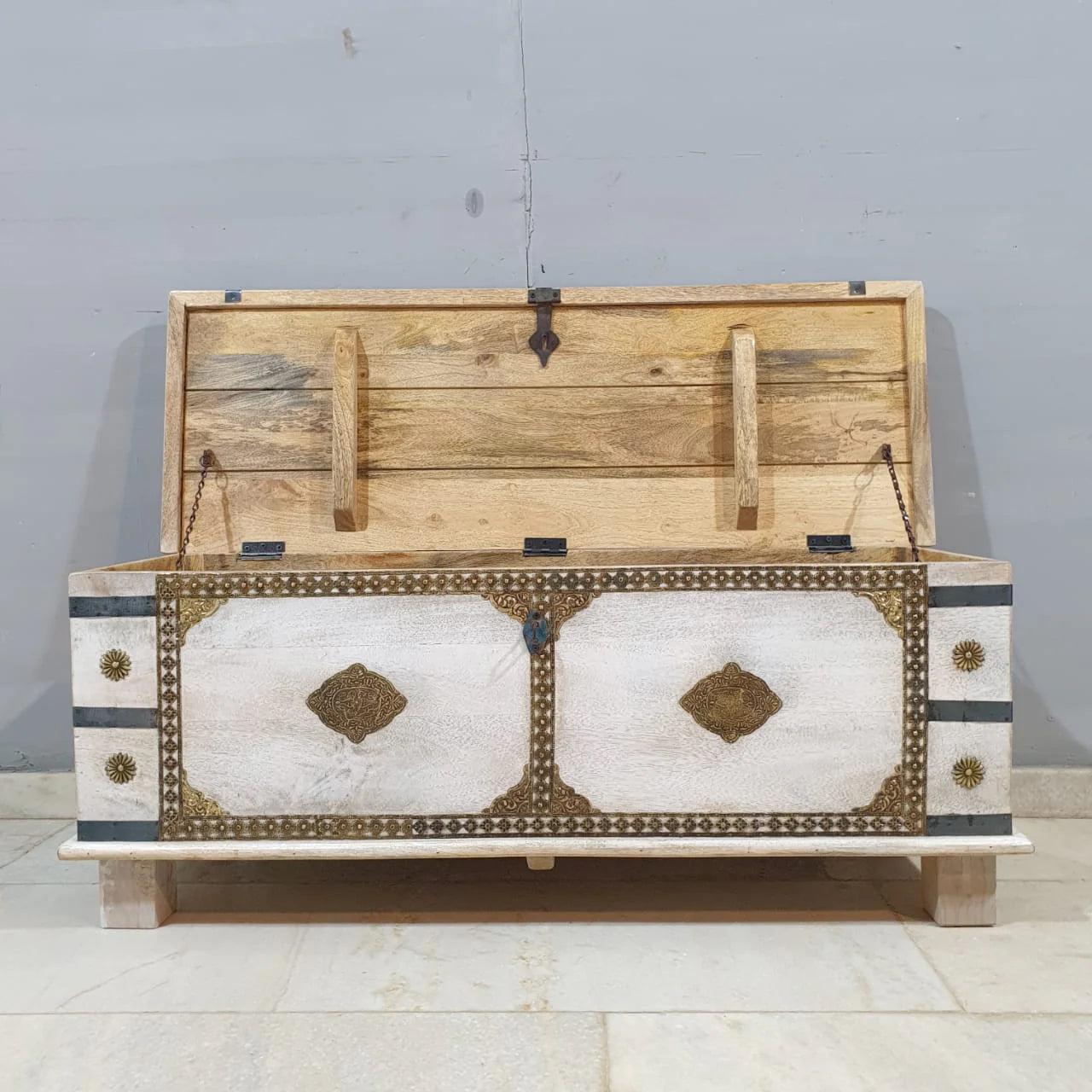 hand carved blanket box, wooden trunk, whitewashed blanket box, brass fittings box, brass medallion trunk, blanket trunk, linen chest, indian furniture, bedroom blanket box, living room trunk, entryway chest, storage bench, coffee table trunk, handmade blanket box, artisan made trunk, premium wood chest, quality wood furniture, durable trunk, sturdy blanket box, timeless chest, elegant trunk, statement blanket box, heirloom chest, mughal style trunk, vintage blanket box, eclectic chest, coastal trunk, rusti