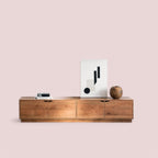 Stylish solid wood TV unit with a natural wood finish.
