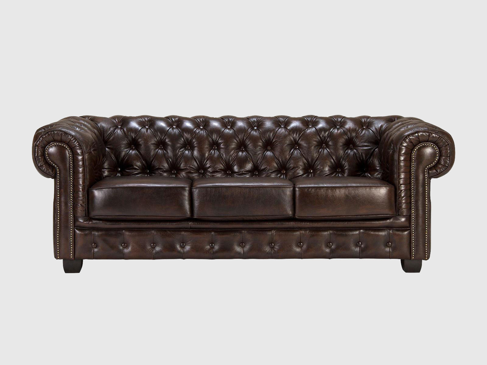 Full front view of a traditional brown Chesterfield 3-seater sofa with genuine leather upholstery and deep button tufting - Living Furn India

