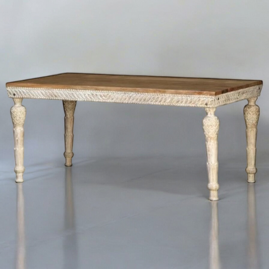 Rustic wood dining table in a vintage-inspired dining room.