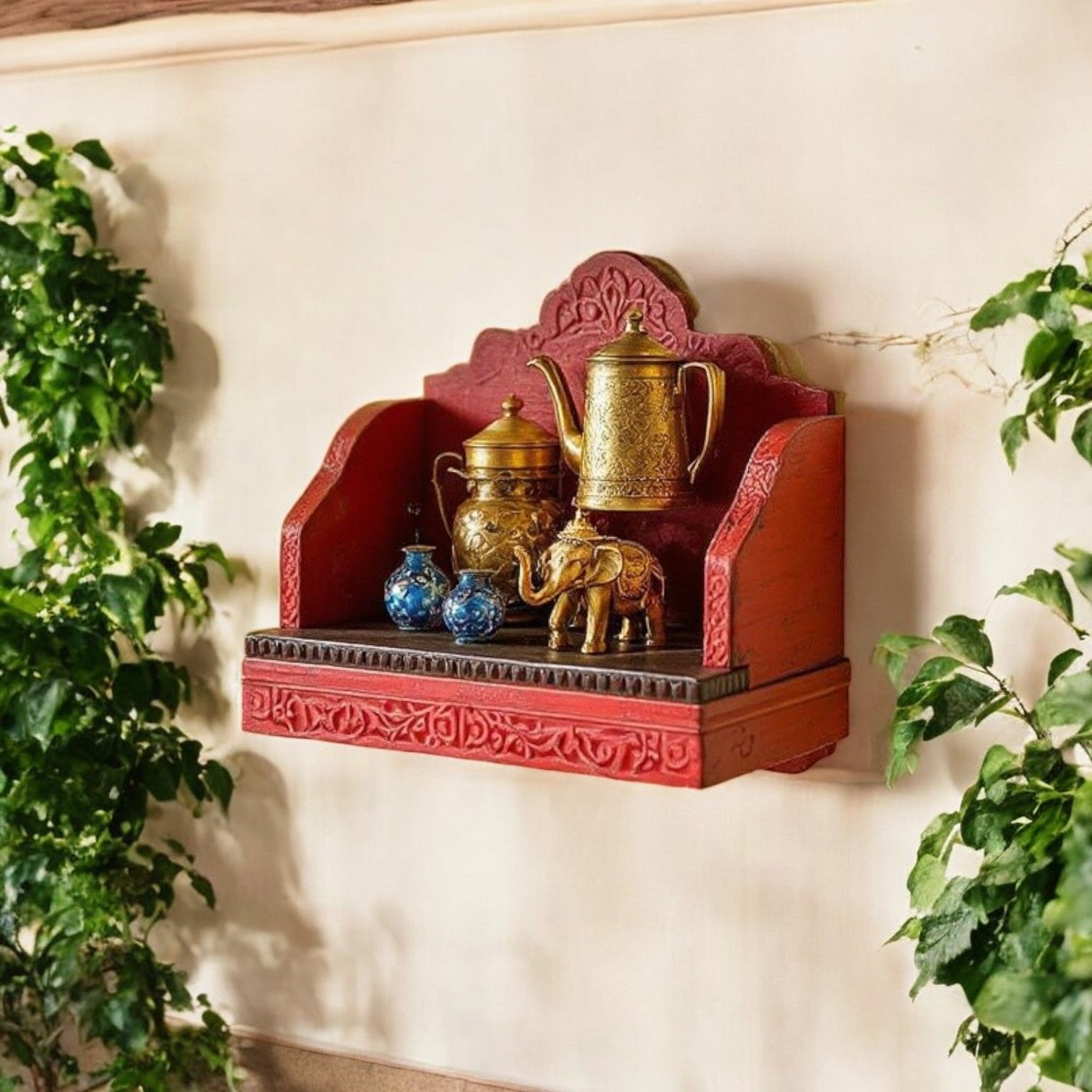 Set of two Jodhpur carved wood temple wall shelves with distressed red and blue finishes, mounted on a wall. Handcrafted in Jodhpur, Rajasthan. Ideal for pooja or decorative displa