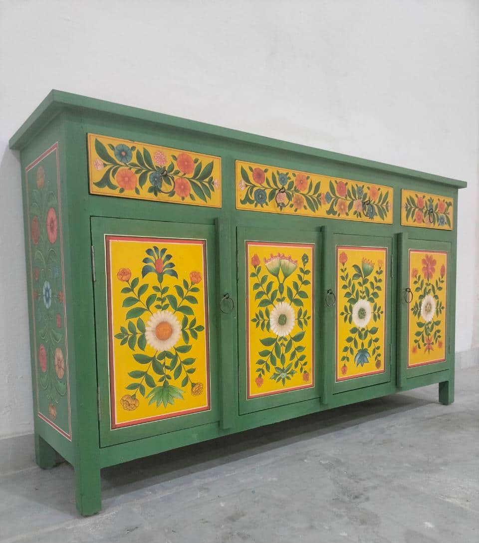 hand painted sideboard, solid wood sideboard, floral sideboard, folk art sideboard, green sideboard, painted cabinet, storage sideboard, bohemian sideboard, colorful sideboard, accent cabinet, living room storage, hallway cabinet, dining room cabinet, bedroom storage, statement sideboard, handmade sideboard, artisan made cabinet, premium wood furniture, quality furniture, durable cabinet, sturdy sideboard, timeless furniture, elegant sideboard, unique cabinet, decorative sideboard, focal piece cabinet, hand