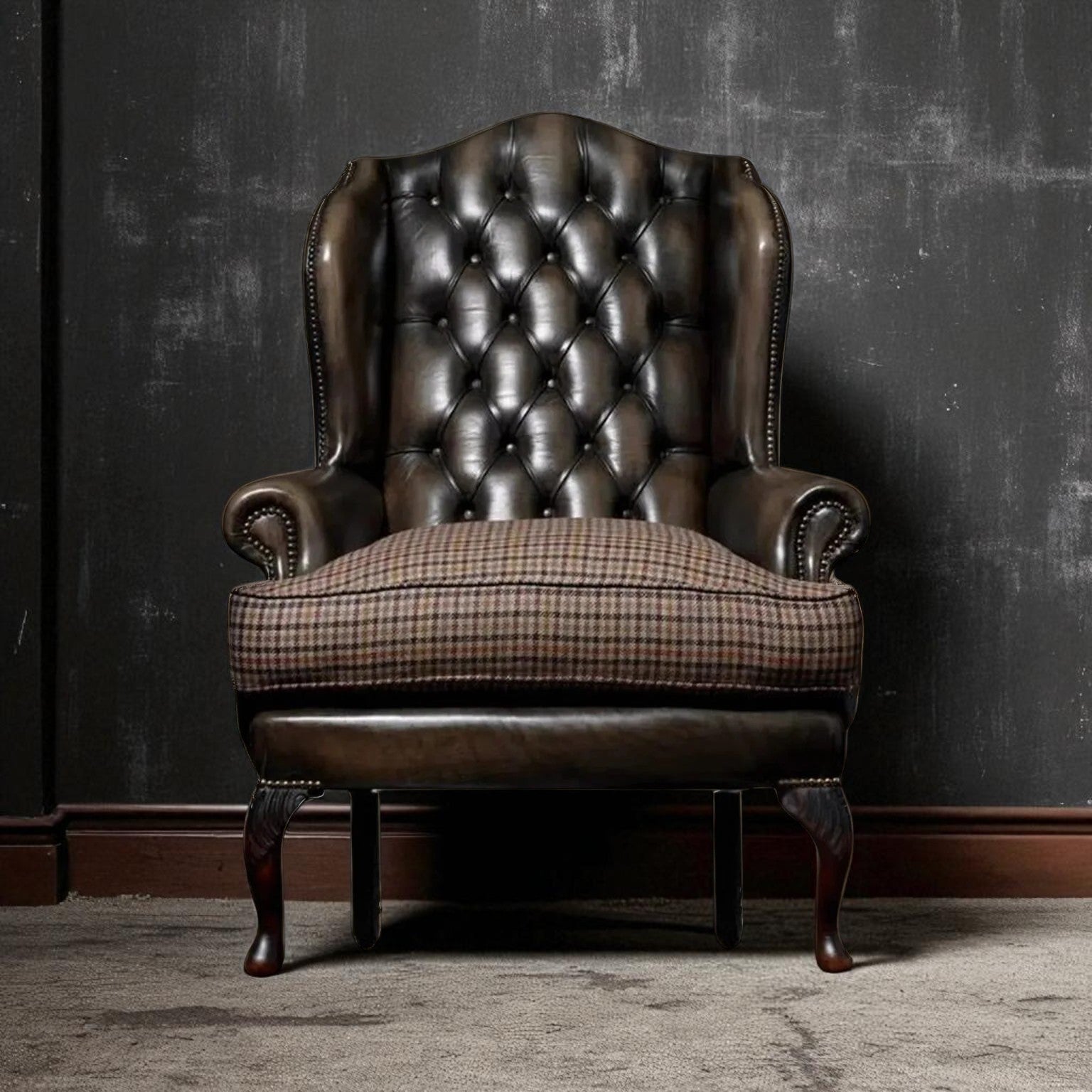 Brown leather armchair with plaid cushion against a dark textured wall
