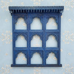 mango wood mirror, jharokha mirror, nine arch mirror, grid mirror panel, indian mirror, blue mirror, distressed blue, carved mirror, wall mirror, statement mirror, palace mirror, scalloped arches, foliate carving, rope border, vine border, baluster brackets, crown cornice, architectural decor, boho decor, global eclectic, vintage inspired, artisan made, handcrafted in india, solid wood frame, large wall mirror, square mirror, entryway decor, living room decor, dining wall, stair landing, heritage decor, ind