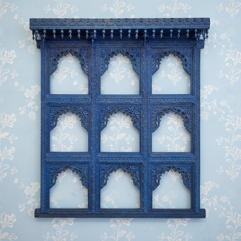 mango wood mirror, jharokha mirror, nine arch mirror, grid mirror panel, indian mirror, blue mirror, distressed blue, carved mirror, wall mirror, statement mirror, palace mirror, scalloped arches, foliate carving, rope border, vine border, baluster brackets, crown cornice, architectural decor, boho decor, global eclectic, vintage inspired, artisan made, handcrafted in india, solid wood frame, large wall mirror, square mirror, entryway decor, living room decor, dining wall, stair landing, heritage decor, ind