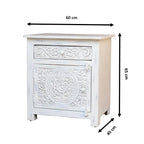 hand carved bedside table, mango wood bedside table, whitewashed bedside table, nightstand, 1 drawer bedside table, 1 door bedside table, lotus carved bedside table, medallion bedside table, indian carved furniture, bedroom bedside table, bedroom nightstand, bedside storage, handmade bedside table, artisan made nightstand, premium wood bedside table, quality wood furniture, durable nightstand, sturdy bedside table, timeless nightstand, elegant bedside table, heirloom nightstand, coastal bedside table, shabb
