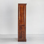Tall wooden cabinet with a single door on a white background