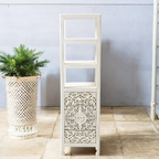 White Wood Bookcase: "Elegant white wood bookcase perfect for storing books and decor in any room."

