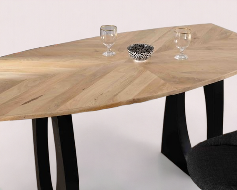 A beautiful solid wood dining table with a natural wood finish, ideal for elegant dining spaces.
