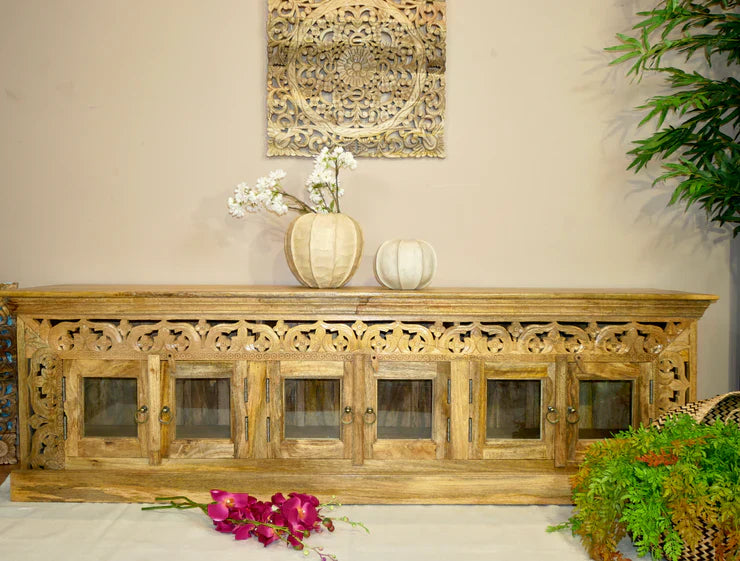 hand carved tv unit, solid mango wood tv stand, glossy timber tv unit, natural wood media console, openwork carved tv stand, 6 door tv unit, glass door tv stand, living room tv unit, entertainment center, tv cabinet, carved wood furniture, traditional tv stand, indian carved tv unit, statement media console, large tv stand, storage tv unit, handmade tv console, artisan made tv unit, premium wood furniture, quality wood tv stand, durable tv unit, sturdy media console, timeless tv stand, elegant tv unit, gran