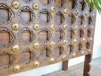 antique indian door console, hand carved console table, reclaimed wood console, brass work console, vintage door table, hall table, entryway console, hallway console, living room console, repurposed door furniture, architectural salvage console, carved wood console, indian antique furniture, heritage console table, unique console table, statement console, decorative console, one of a kind console, handmade console table, artisan made console, traditional indian console, vintage brass console, rustic console