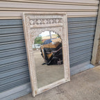hand carved mirror, solid wood mirror, rustic white mirror, distressed white mirror, horizontal mirror, wall mirror, mehrab arch mirror, arched mirror, jali lattice mirror, entryway mirror, console mirror, living room mirror, bedroom mirror, decorative mirror, indian furniture, handmade mirror, artisan made mirror, premium wood mirror, quality mirror, durable mirror, sturdy mirror, timeless mirror, elegant mirror, statement mirror, ornate mirror, unique mirror, sculptural mirror, focal piece mirror, handcra