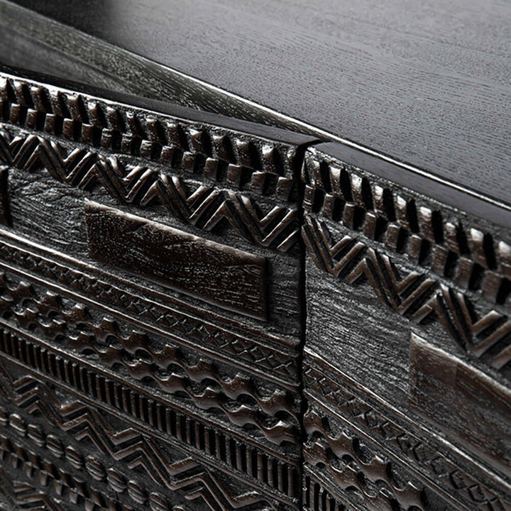 Close-up of unique detailed carvings on the doors of a dark solid wood Tabwa cabinet - Jodhpur handcrafted furniture

