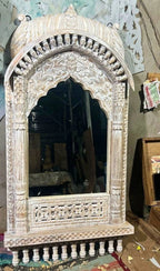 mango wood mirror, jharokha mirror, indian mirror, carved mirror, arched mirror, mehrab arch, dome canopy, palace mirror, rustic mirror, distressed white, whitewashed mirror, farmhouse decor, boho decor, global eclectic, vintage inspired, antique style, floral carving, foliate carving, scalloped arch, baluster brackets, lattice carving, turned gallery, architectural mirror, wall mirror, statement mirror, entryway mirror, living room mirror, mandir mirror, handcrafted in india, artisan made, solid wood frame