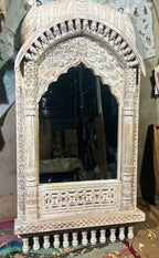 mango wood mirror, jharokha mirror, indian mirror, carved mirror, arched mirror, mehrab arch, dome canopy, palace mirror, rustic mirror, distressed white, whitewashed mirror, farmhouse decor, boho decor, global eclectic, vintage inspired, antique style, floral carving, foliate carving, scalloped arch, baluster brackets, lattice carving, turned gallery, architectural mirror, wall mirror, statement mirror, entryway mirror, living room mirror, mandir mirror, handcrafted in india, artisan made, solid wood frame
