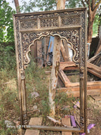 mango wood mirror, jharokha mirror, arched mirror, carved mirror, full size mirror, indian mirror, boho mirror, farmhouse mirror, distressed mirror, antique finish, vertical mirror, entryway mirror, wall mirror, statement mirror, palace mirror, scalloped arch, floral carving, foliate spandrels, fluted pilasters, rope border, vine border, jaali frieze, layered molding, vintage inspired, artisan made, handcrafted in india, solid wood frame, ready to hang, iron hooks, kiln dried wood, reinforced joinery, livin