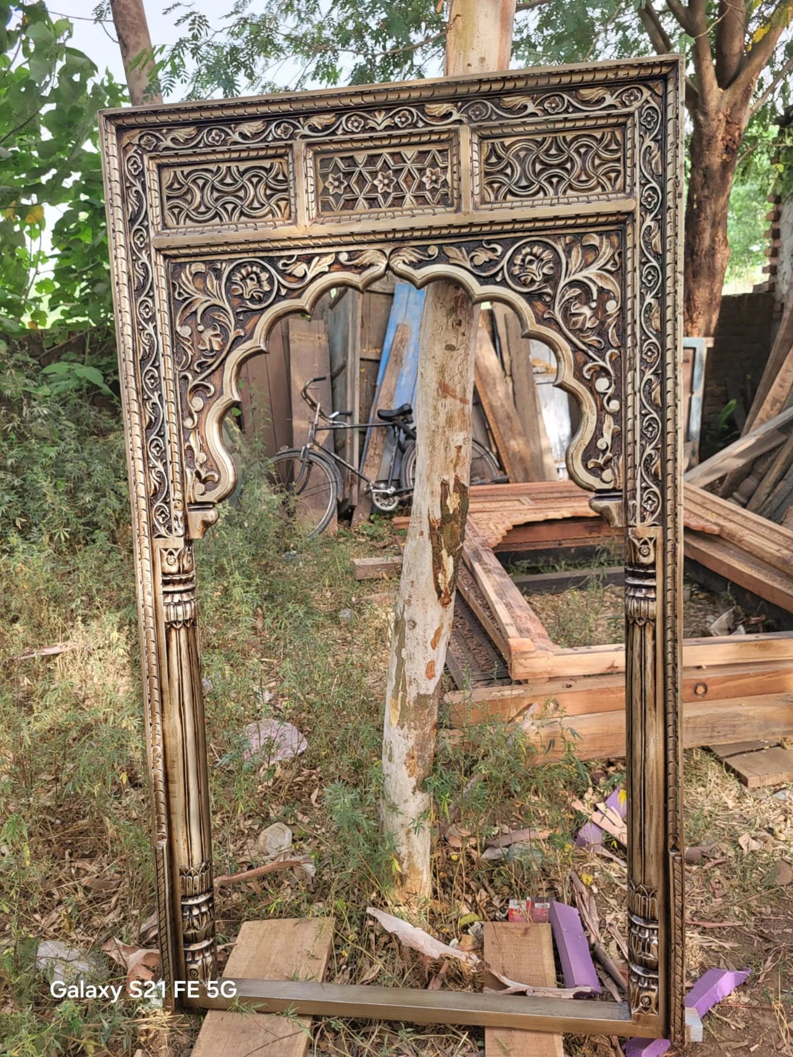 mango wood mirror, jharokha mirror, arched mirror, carved mirror, full size mirror, indian mirror, boho mirror, farmhouse mirror, distressed mirror, antique finish, vertical mirror, entryway mirror, wall mirror, statement mirror, palace mirror, scalloped arch, floral carving, foliate spandrels, fluted pilasters, rope border, vine border, jaali frieze, layered molding, vintage inspired, artisan made, handcrafted in india, solid wood frame, ready to hang, iron hooks, kiln dried wood, reinforced joinery, livin