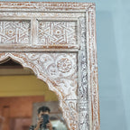 hand carved mirror, mango wood mirror, rustic white mirror, distressed white mirror, large mirror, oversized mirror, full length mirror, wall mirror, mehrab arch mirror, arched mirror, jali lattice mirror, entryway mirror, dressing mirror, decorative mirror, indian furniture, handmade mirror, artisan made mirror, premium wood mirror, quality mirror, durable mirror, sturdy mirror, timeless mirror, elegant mirror, statement mirror, ornate mirror, unique mirror, sculptural mirror, focal piece mirror, handcraft