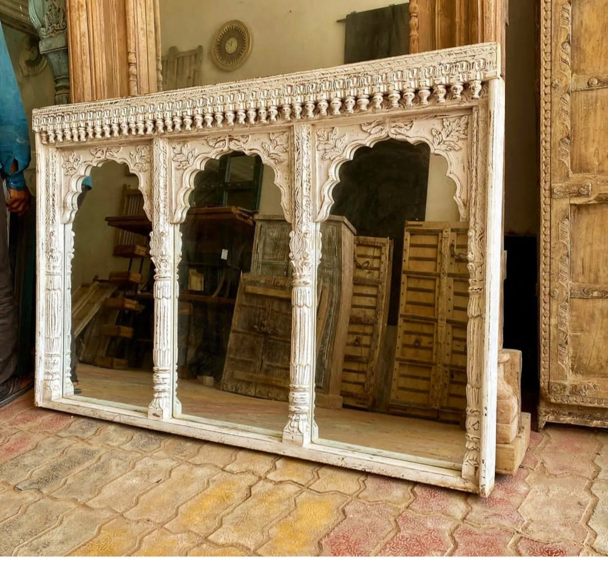 mango wood mirror, jharokha mirror, triple arch mirror, carved mirror, rustic white mirror, distressed mirror, indian mirror, arched mirror, wall mirror, statement mirror, palace mirror, scalloped arches, floral spandrels, fluted pilasters, bracketed cornice, vintage inspired, farmhouse boho, global eclectic, handcrafted in india, artisan made, solid wood frame, large wall mirror, console mirror, buffet mirror, living room mirror, entryway mirror, dining room mirror, architectural mirror, heirloom quality, 